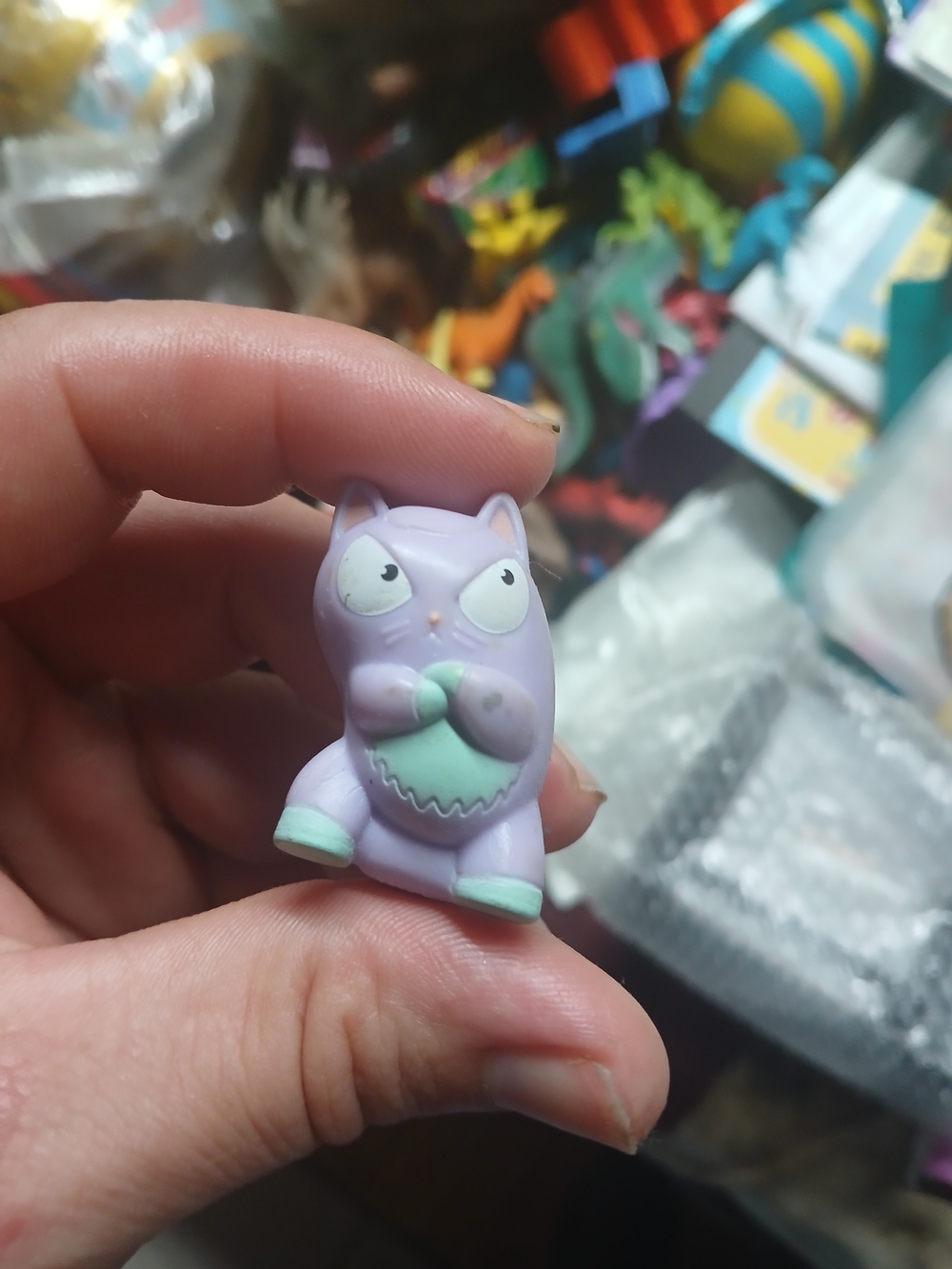 collectible mini figure from the Hasbro Lost Kitties blind-box series. Purple